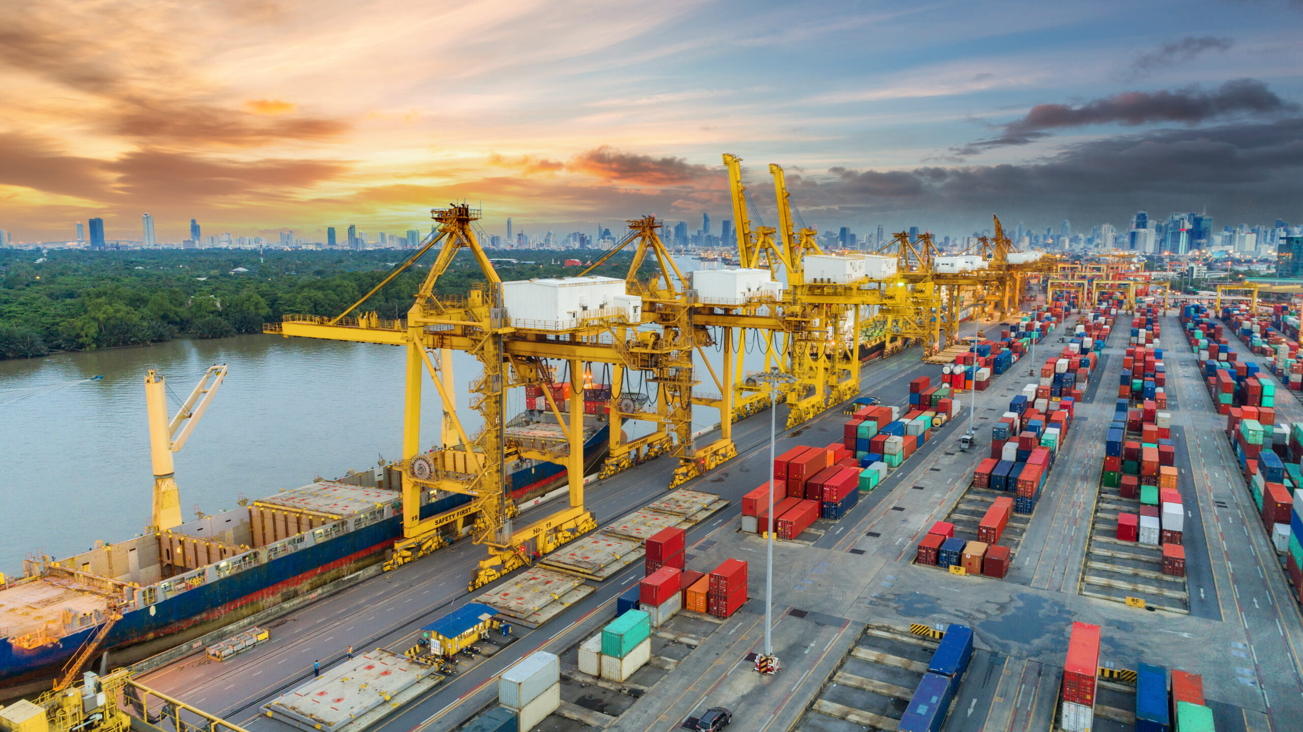 Aerial view container ship from sea port warehouse waiting for d