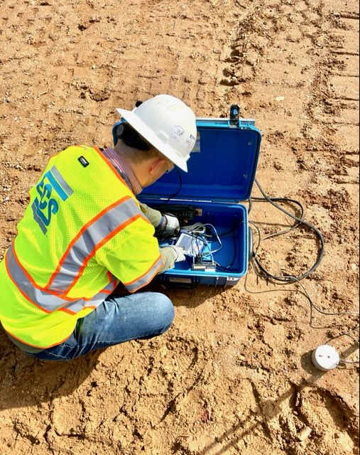 ECS engineer setting up equipment