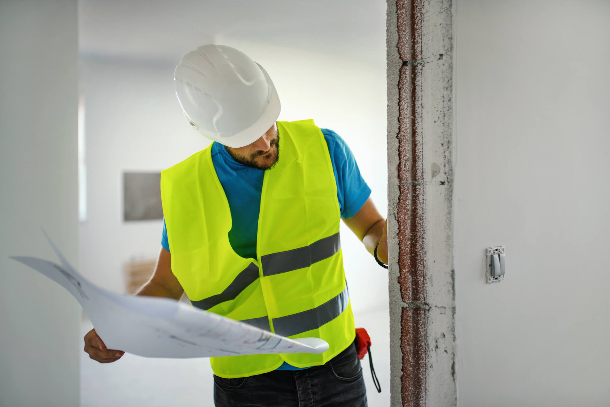 engineer analyzing brick wall