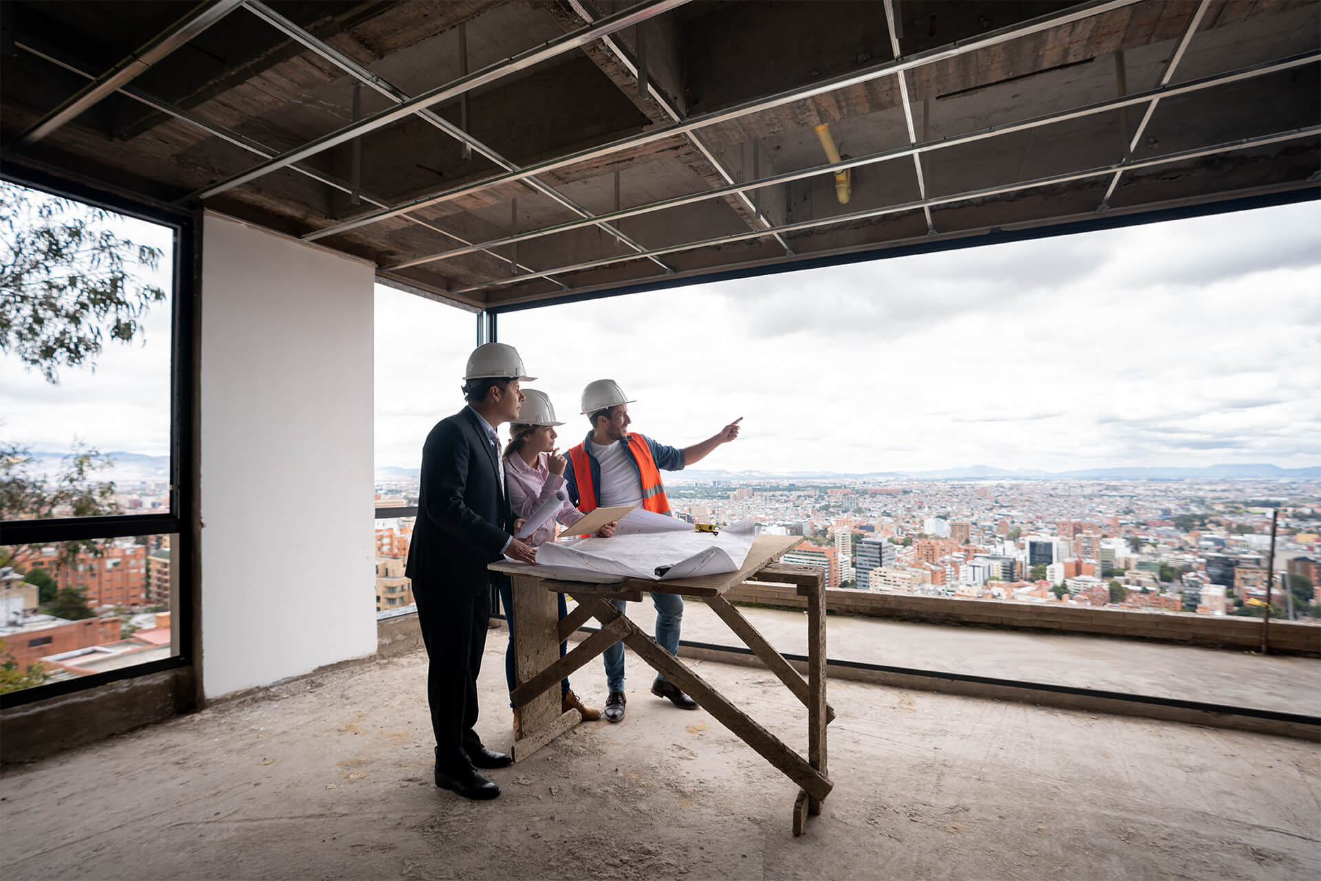 engineers reviewing construction plans