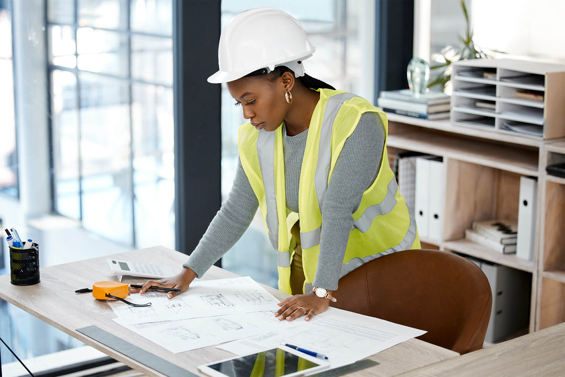 engineer reviewing construction plans