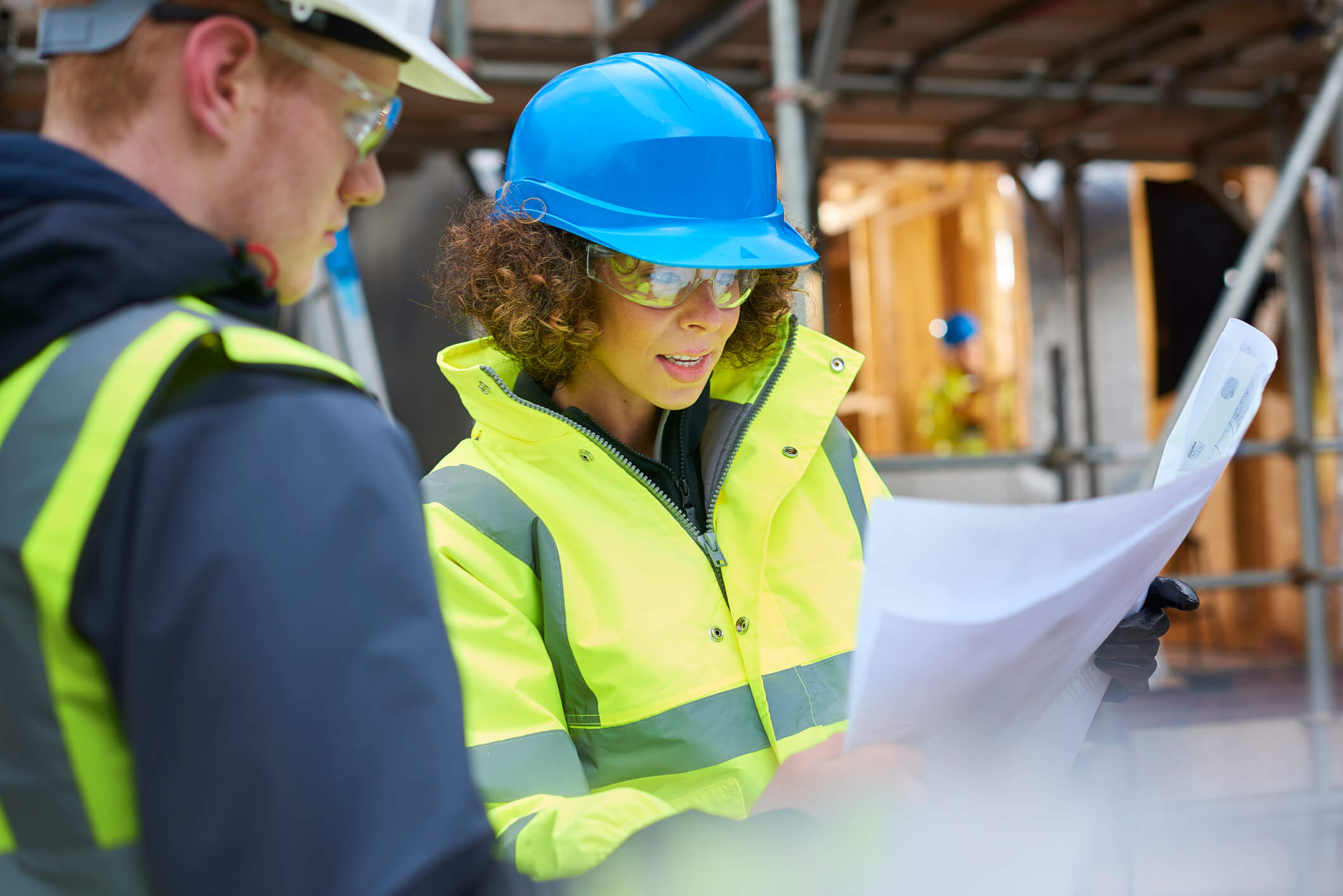 two engineers reviewing construction analysis