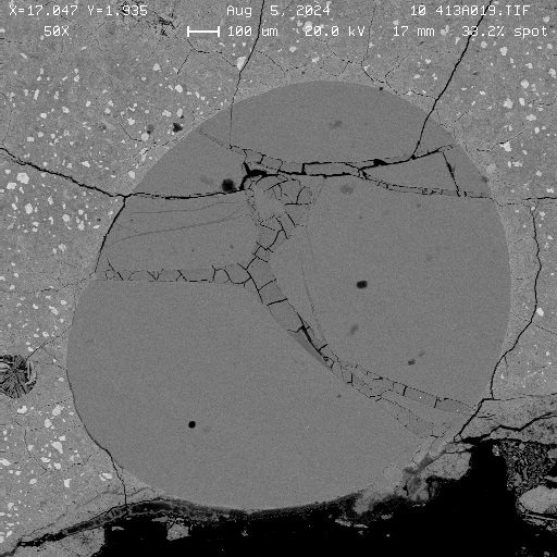 MaterialsScienceLab A Backscattered electron (BSE) image showing ASR induced cracking in glass bead in plaster.