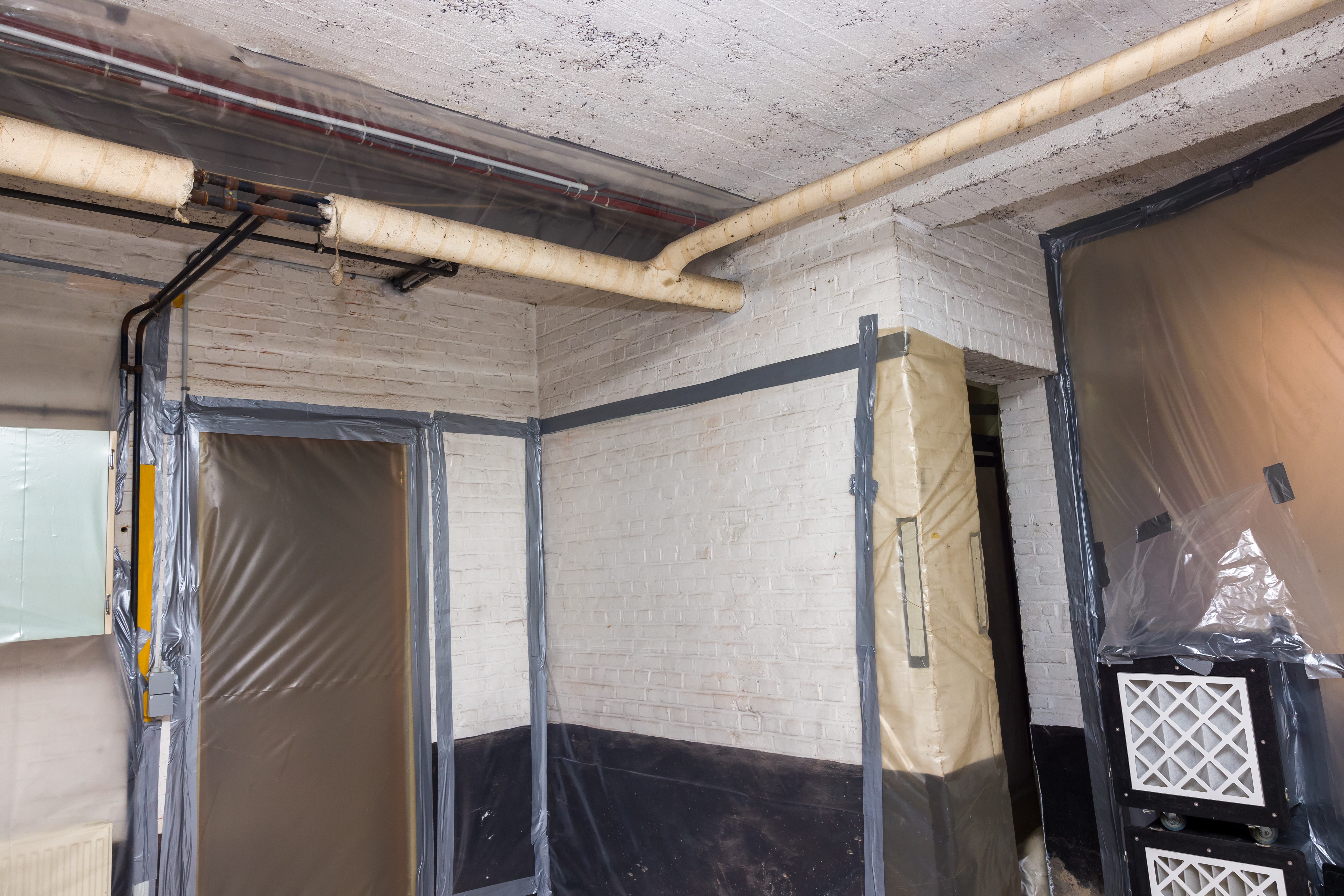 Asbestos,Removal,Works,Off,Heating,Pipes,Insultation,Going,On,In