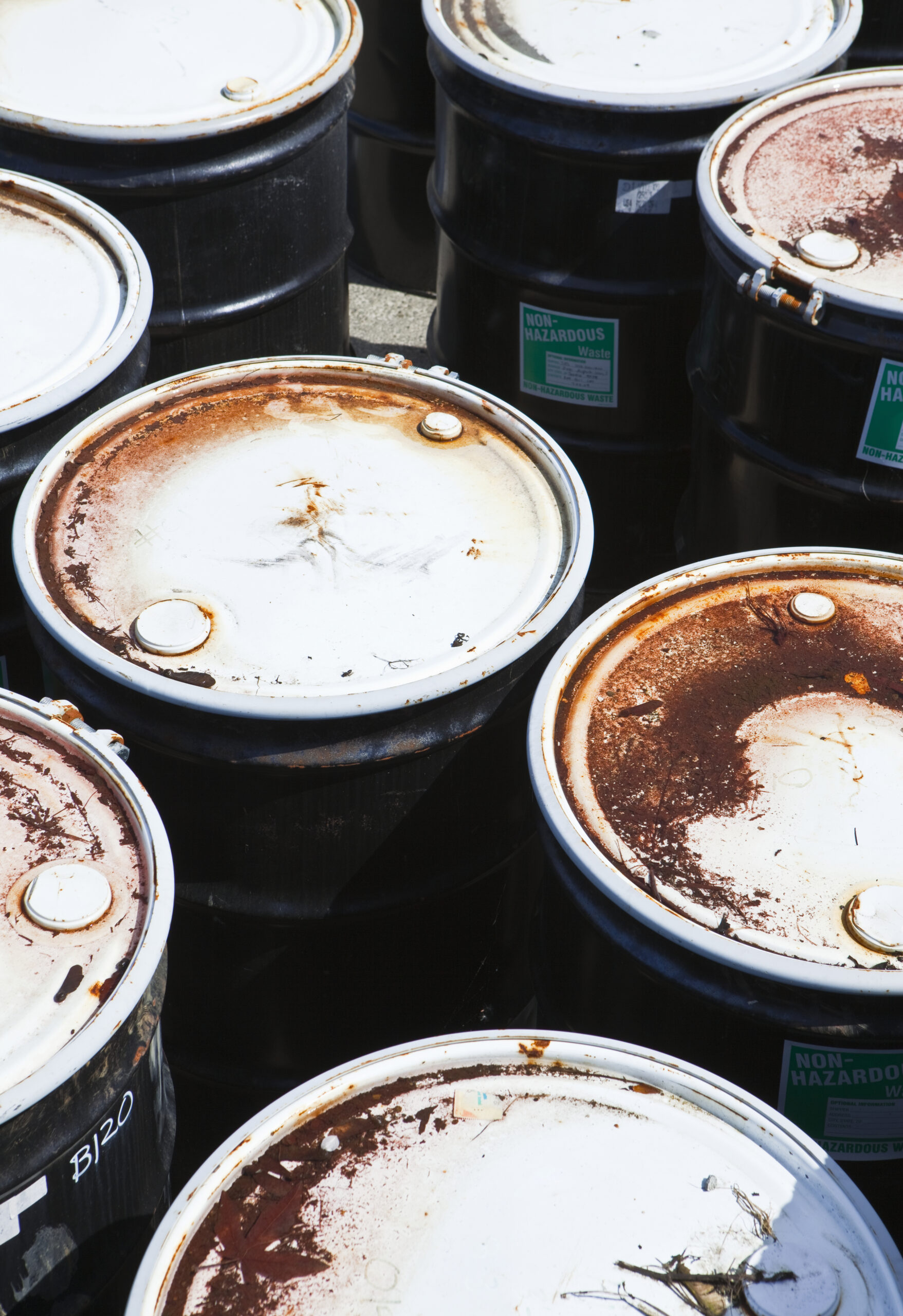 United States,Weathered metal waste barrels, rusty and decaying