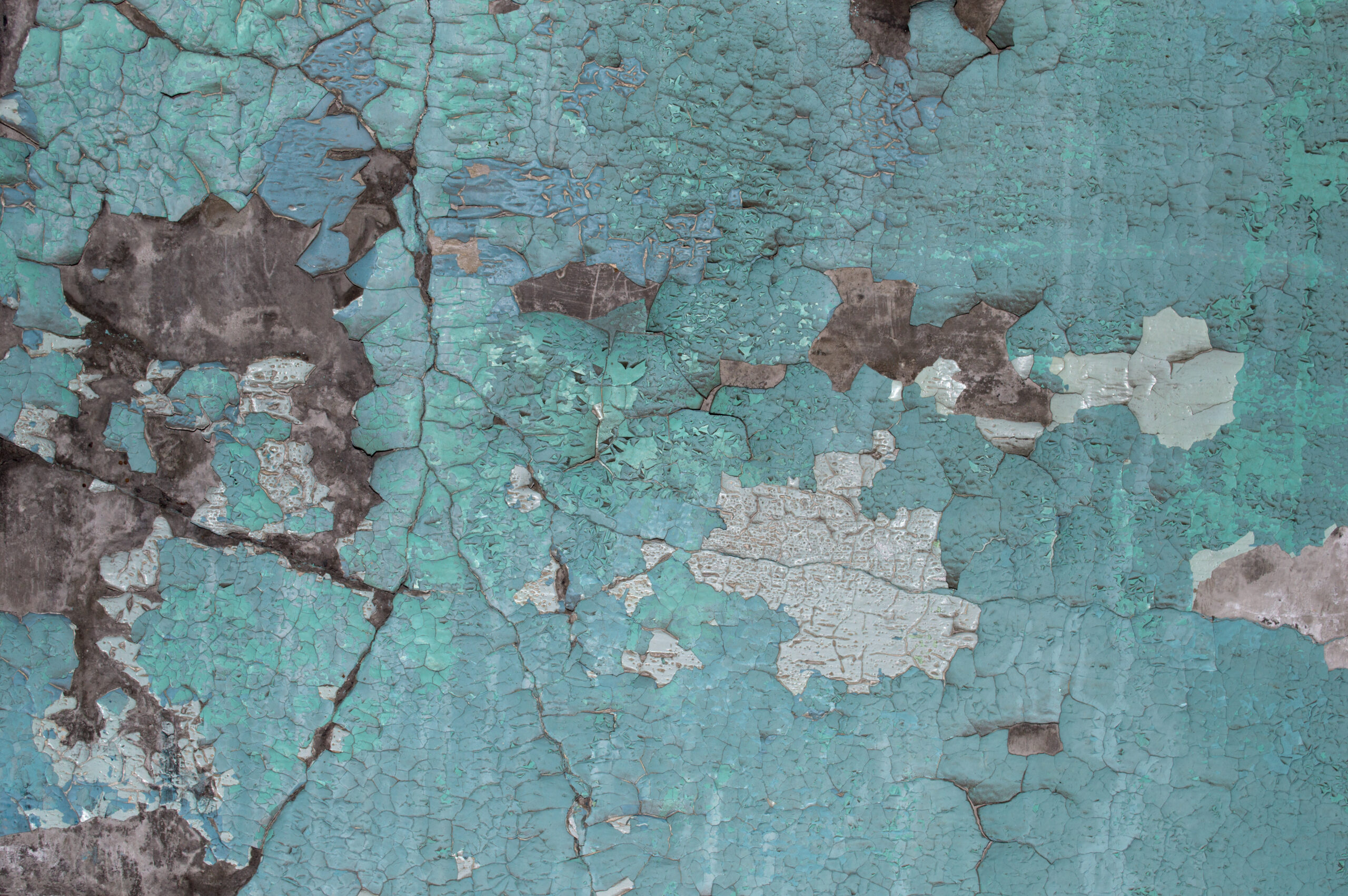 Peeling lead based paint on wall seamless texture. Pattern of rustic grunge material